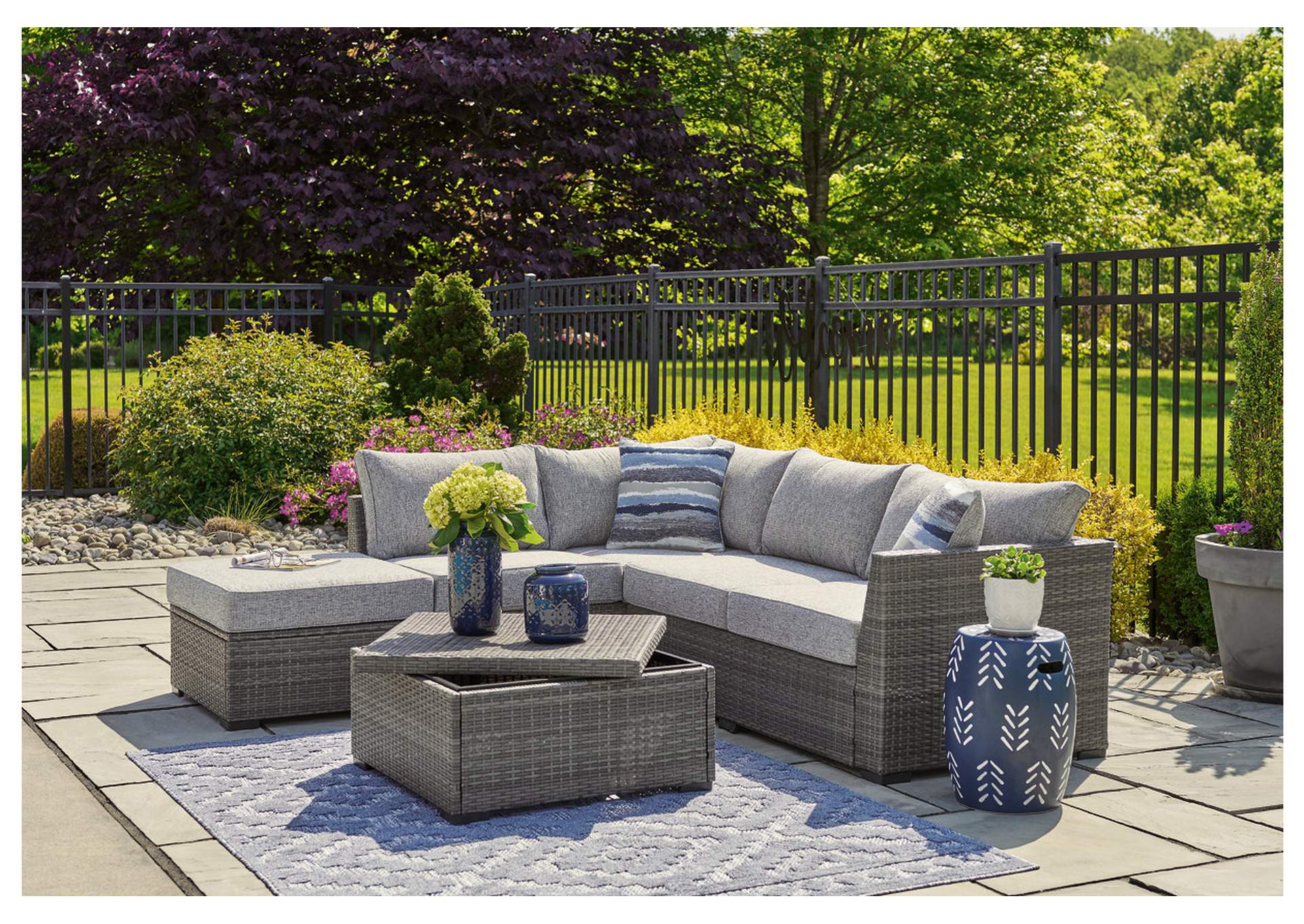 Petal Road Outdoor Loveseat Sectional/Ottoman/Table Set (Set of 4),Outdoor By Ashley