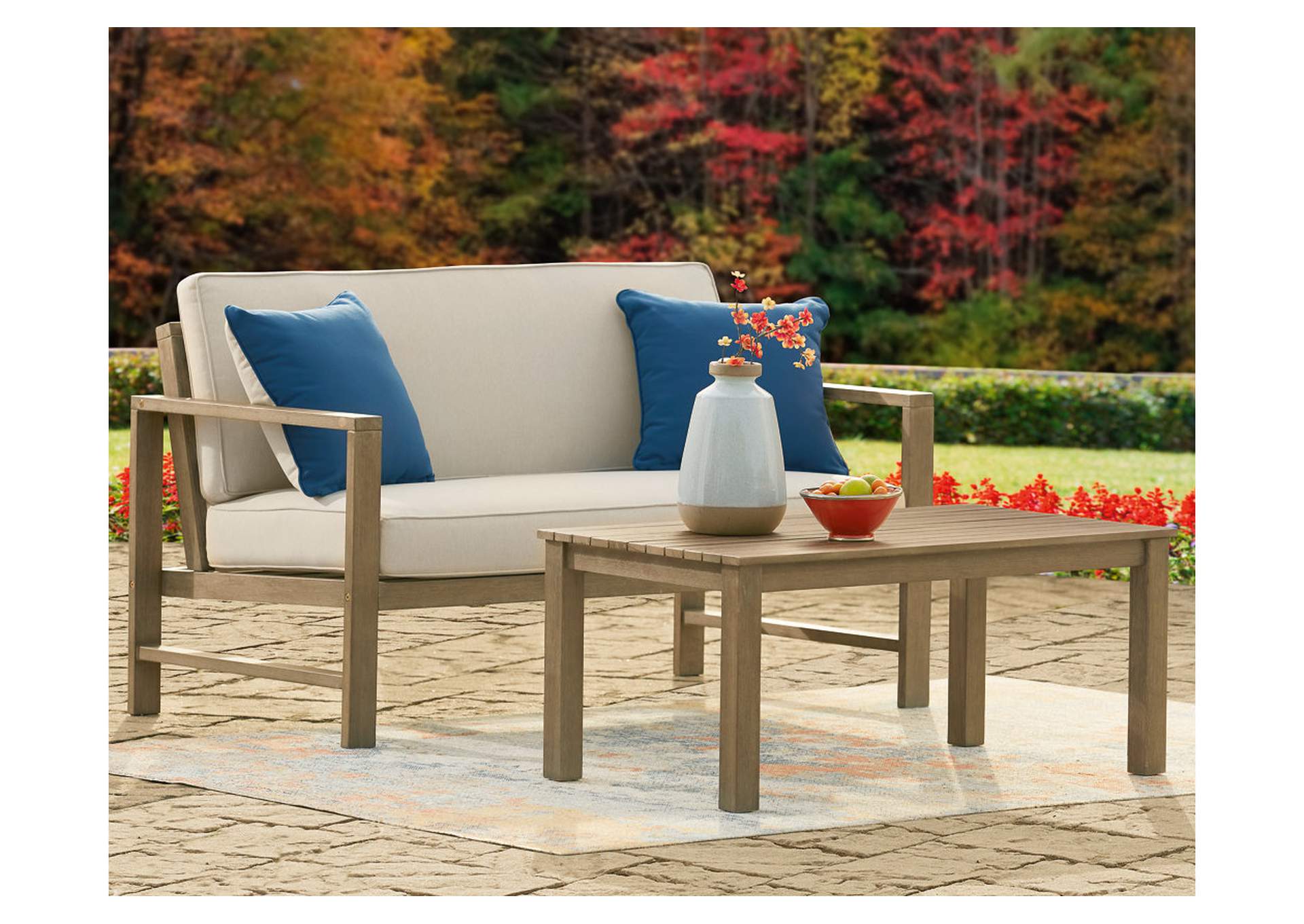 Fynnegan Outdoor Loveseat with Table (Set of 2),Outdoor By Ashley
