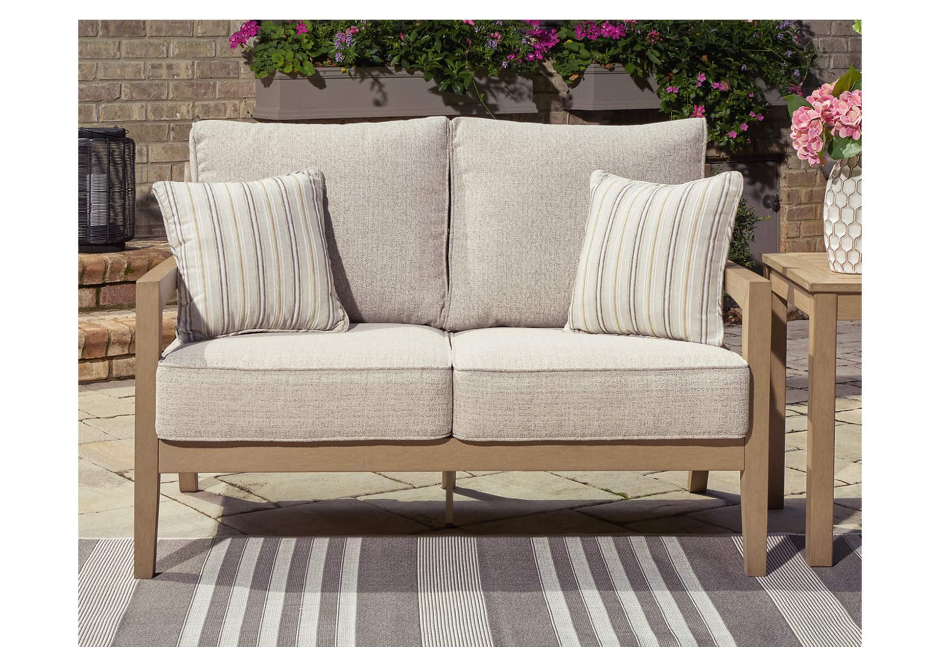 Hallow Creek Outdoor Loveseat with Cushion,Outdoor By Ashley