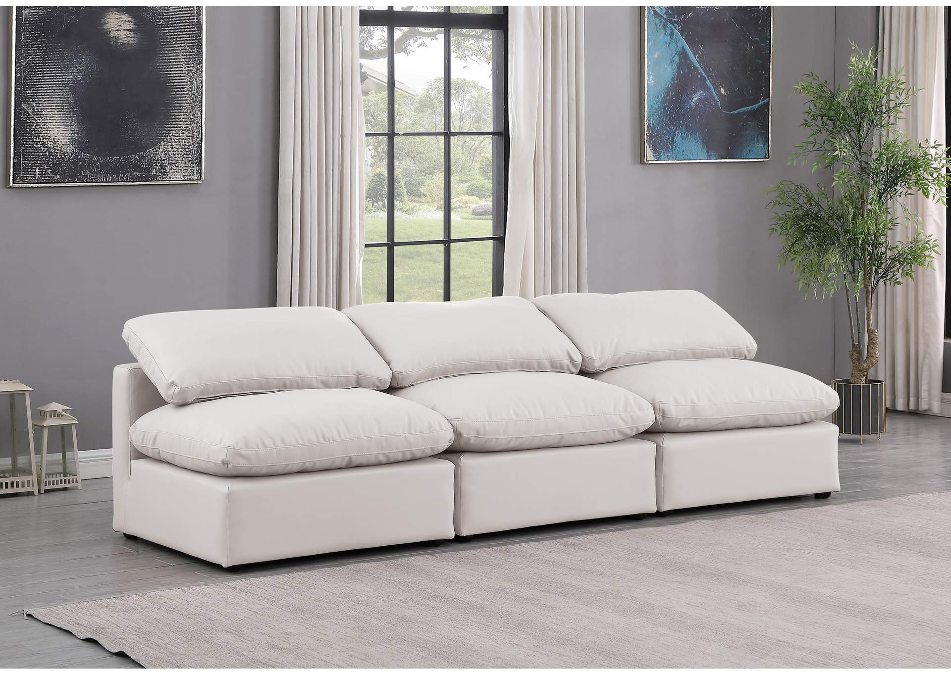 Indulge Cream Faux Leather Modular Sofa,Meridian Furniture