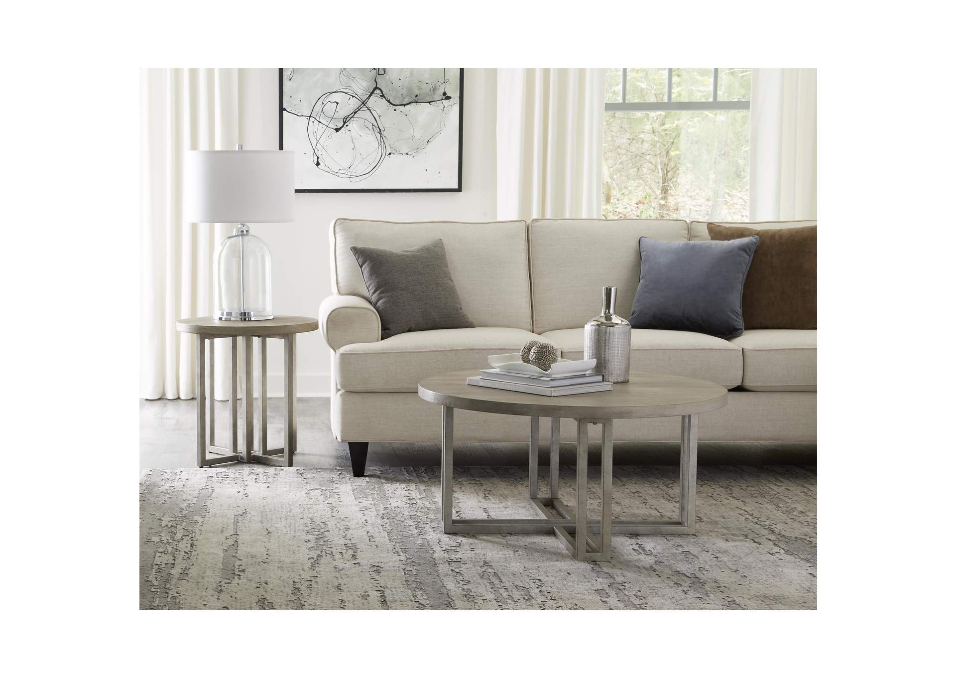 Adelyn Crema Gray Round Cocktail Table,Riverside